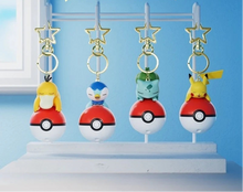 Load the image into the gallery viewer, Pokeball with Pokemon Keychain Pendant