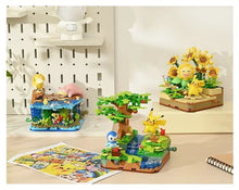 Lade das Bild in den Galerie-Viewer, Pokémon Baustein Spielzeug Sets (Pikachu Sonnenblume, Enton und Flegmon oder Pikachu und Plinfa)
