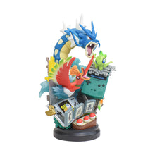 Load the image into the gallery viewer, buy Pokémon Gyarados or Charizard Gameboy Statue