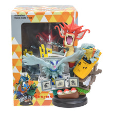 Load the image into the gallery viewer, buy Pokémon Gyarados or Charizard Gameboy Statue