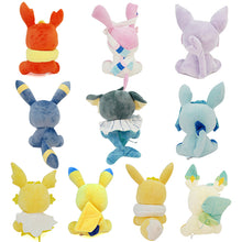 Load the image into the gallery viewer, buy a set of 10 Eevee Evolutions cuddly toys (approx. 17cm).